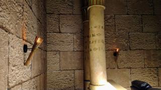 Hard-coated columns with embedded hieroglyphics painted